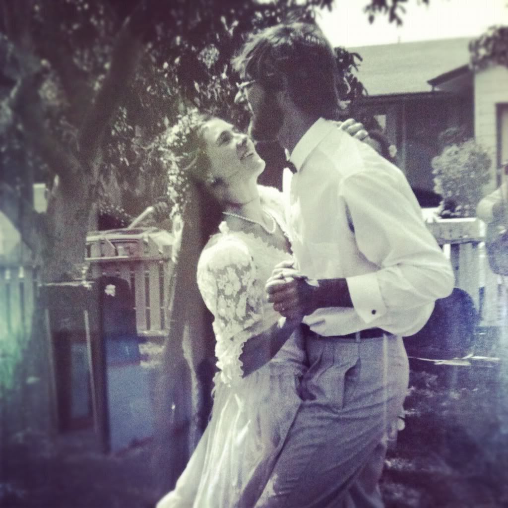 Mom and dad dancing on their wedding day