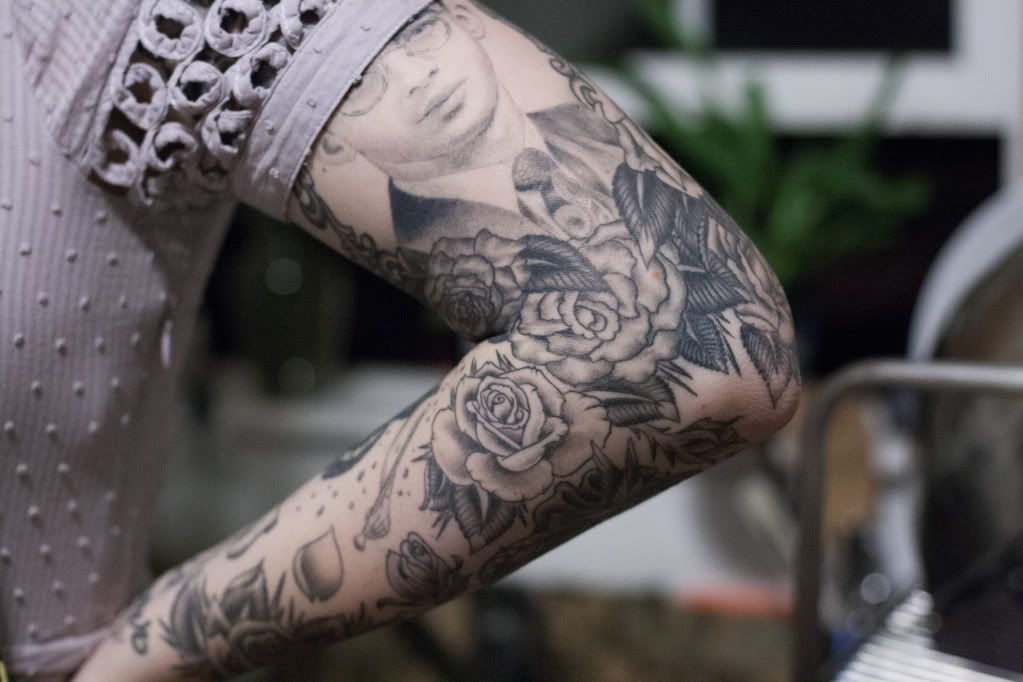 Jessica's tattoos and lavender dress