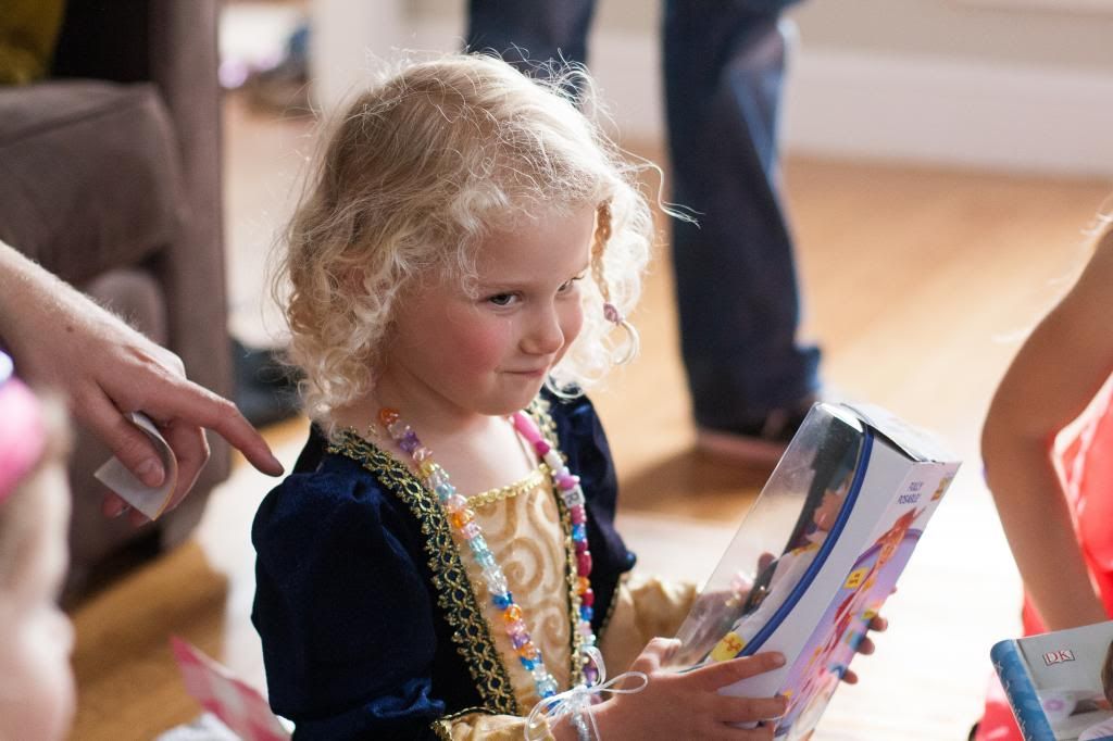 opening presents at her party