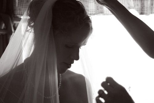 bride veil before wedding dressing