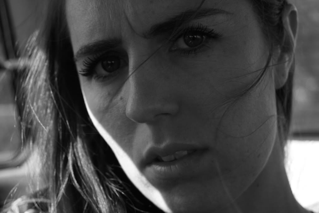 wind swept hair up close portrait black and white