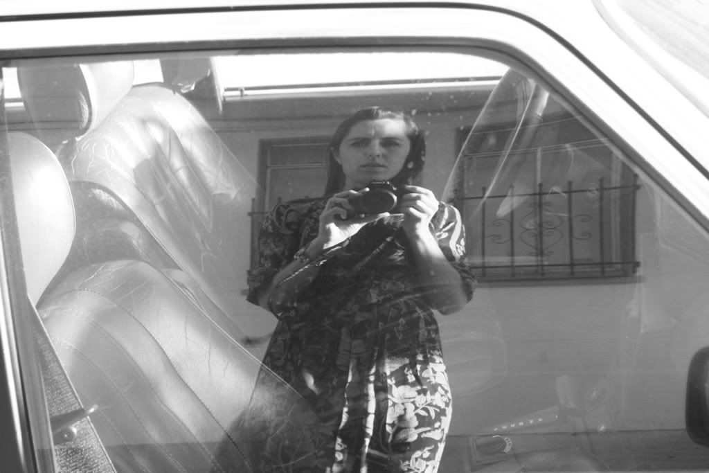 car reflection driving woman black and white photo